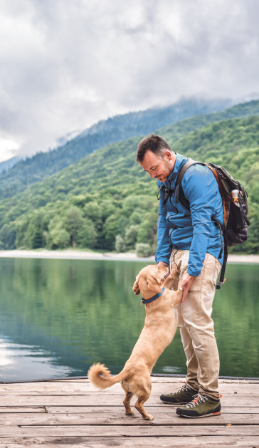 Man with his dog at sidelake.